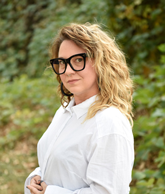 Sarah Higgins headshot. Photo credit: Jill Frank